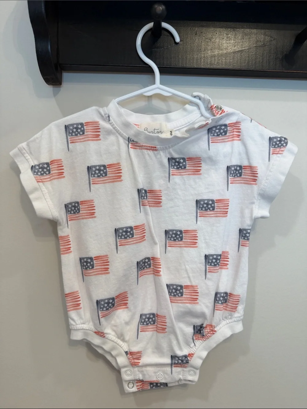 Burton White Baby One-Piece with Red & Blue Flag Print